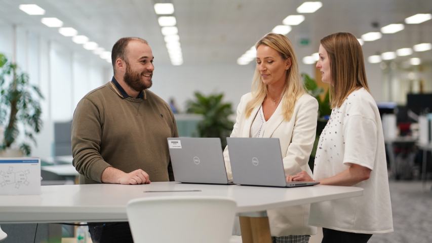 Aegon employees working at desk