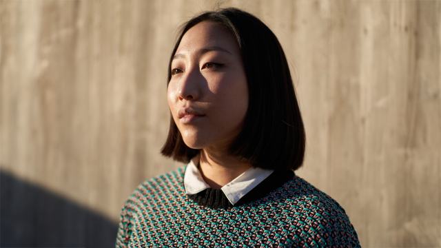 woman in casual clothes looking away